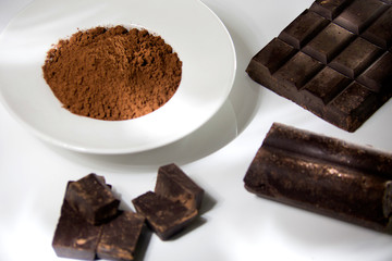 Theobroma cocoa- cocoa- chocolate powder and pasta on white background