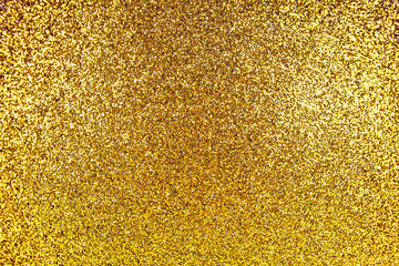 Abstract yellow gold bokeh glitter sparkle background
