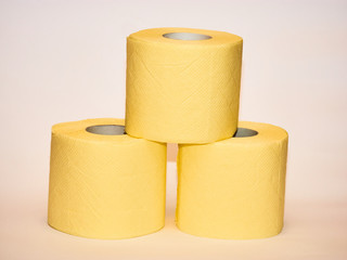 pyramid of toilet paper isolated over white background