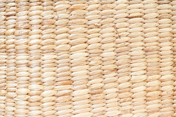 Woven background. A closed up texture of Wickerwork made from water hyacinth.