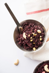 Beetroot Halwa garnished with Pistachio served in a bowl, selective focus
