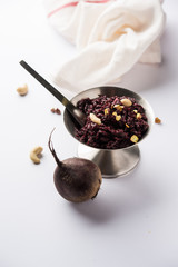 Beetroot Halwa garnished with Pistachio served in a bowl, selective focus
