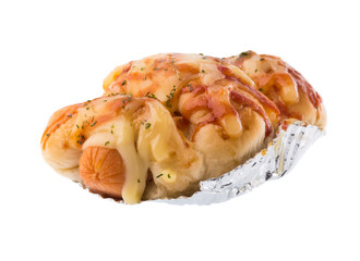 Hot dog with ketchup on white