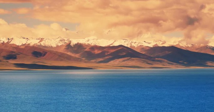 4k time lapse of huge asaka clouds mass rolling over lake namtso & Tanggula snow mountain peak,tibet mansarovar,Tibet's second largest lake,is the third largest saltwater lake in China.