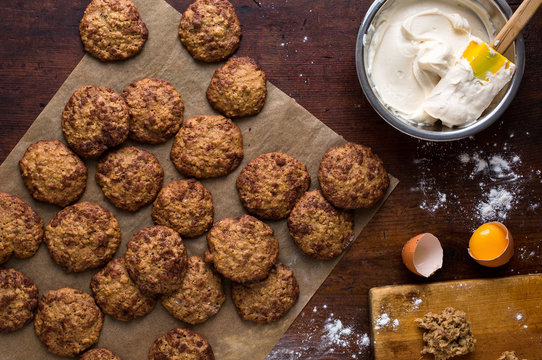 Overhead view of coconut oatmeal sandwich cookies with mascarpone filling