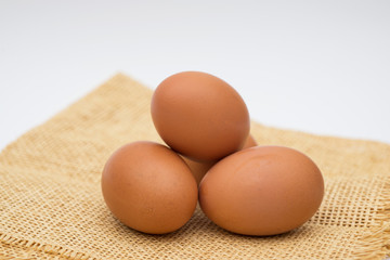 egg on sackcloth and white background texture