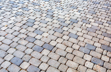 Grey paving stones as background texture
