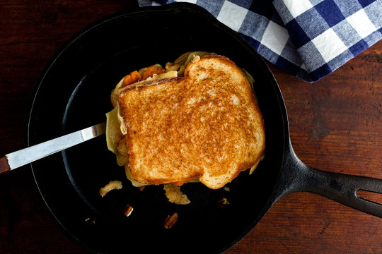 Overhead View Of Potato Grilled Cheese Sandwich In Frying Pan