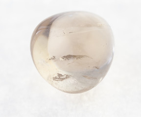 tumbled Smoky quartz gemstone on white