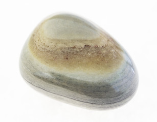 polished gray-green agate stone on white
