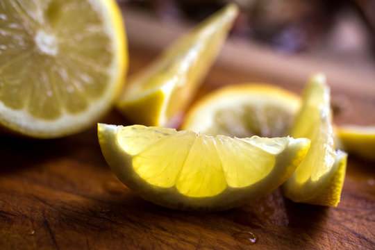 Close up of lemon slices on wooden table