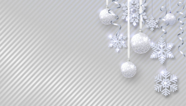 Christmas and New Year poster with shiny Christmas balls, snowflakes and confetti.