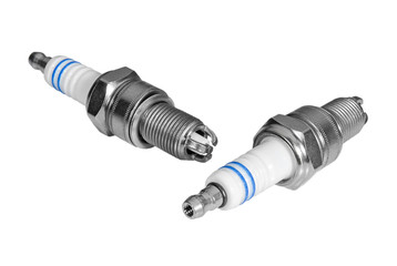 Car spark plugs on white background