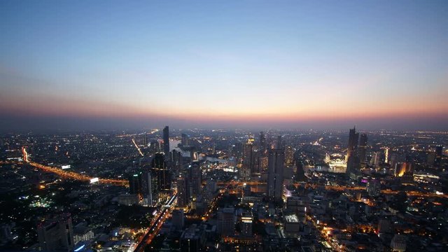 Dusk to night, Aerial view of Bangkok's city, Thailand, Time lapse.
