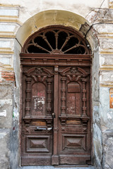 Fototapeta na wymiar Traditional classic style wooden medieval vintage brown painted door