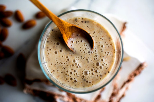 Close Up Of Banana Oatmeal Almond Smoothie Served In Glass