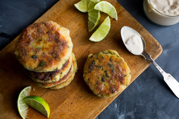 Close up of spicy fish cakes served on cutting board