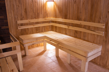 Obraz na płótnie Canvas Sauna is wooden. Body rest. Steam on the coals. health