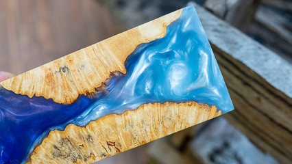 casting epoxy resin stabilizer burl wood blure sky abstract background