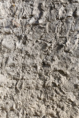 rough texture of a plaster gray wall.