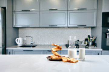 Flying toasts for breakfast and a glass of milk drink. Levitation food and healthy breakfast concept.