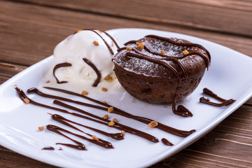Mouth watering delicious chocolate fondant cake, restaurant serving.