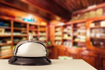 Vintage hotel reception service desk bell.