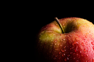Red Apple Covered in Water Droplets 