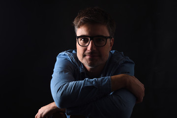 portrait of a man on black