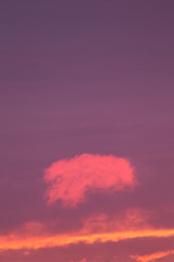 Small pink cloud at sky