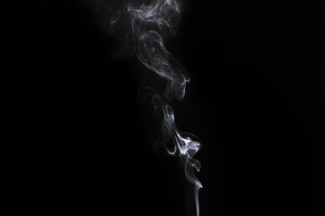 abstract white gray smoke in dark background. © thithawat