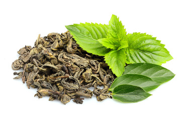Fototapeta na wymiar Green tea with fresh leaf and mint isolated.