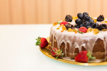 Christmas cake with berries and cream