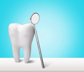 Big tooth model and toothbrush on background