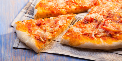 hot Pizza on wooden table