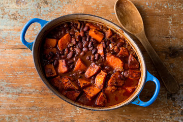 Overhead view of baked beans with sweet potatoes and chipotle