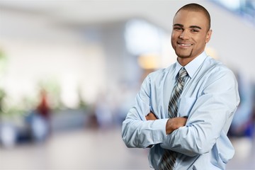 Happy business man in black suit