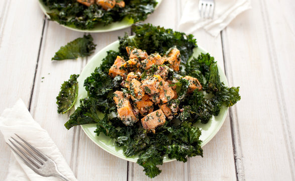 Close Up Of Roasted Sweet Potato And Kale Salad Served On Plate