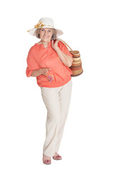 Beautiful senior woman in hat on white background