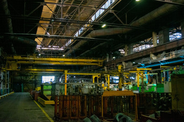 Naklejka premium Production machines, equipment and heavy iron stamping in the industrial shop forge plant. Manufacture of auto parts