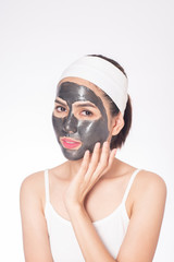 beautiful woman masking her face on white background