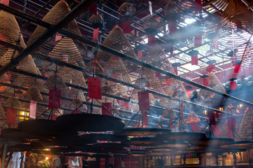 Incense coils and smoke inside Man Mo Temple