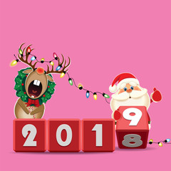 Santa Claus and decorated Reindeer with wreath and luminous electric garland changing date from 2018 to 2019 rotating cubes with numbers