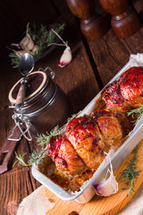 tasty small rolling roasts fully with dried plum and bacon