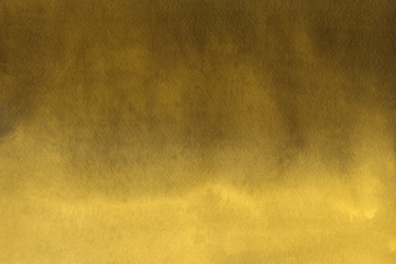 Gold watercolor texture with abstract washes and brush strokes on the white paper background.