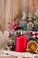 Christmas greeting card. Festive decoration on wooden background. New Year concept. Copy space.  Flat lay. Top view.