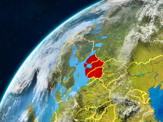Baltic States on realistic model of planet Earth with country borders and very detailed planet surface and clouds.