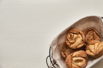 muffins in a basket on a white background. hygge style