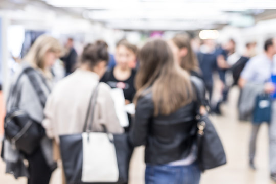 Blured Image Of Businesspeople Networking And Socializing During Coffee Break At Business Event. Business And Entrepreneurship Concept.