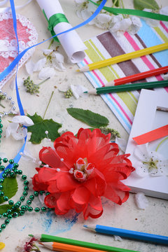 Happy Valentine Day card with paper note book on table. Red hearts, flower, gift, pencil on table